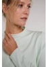 Oui | Pale green top
