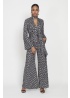 Onjenu | Fenn Jumpsuit Polka Metallic Black Dot